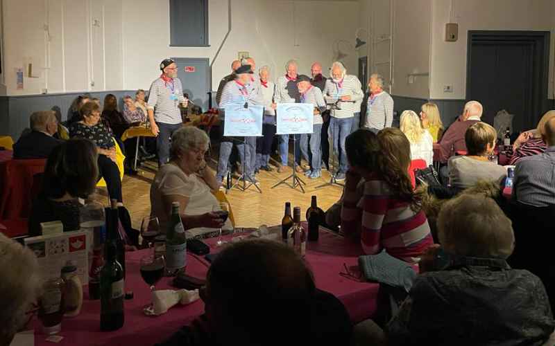 Illustrating The Motley Crew sing for RNLI supper on Brightlingsea Info