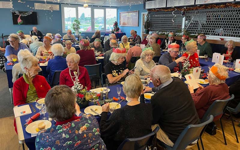 a group of people having lunch